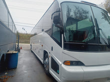 2006 MCI J4500 “sleeper/seated coach”