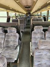 2006 MCI J4500 “sleeper/seated coach”